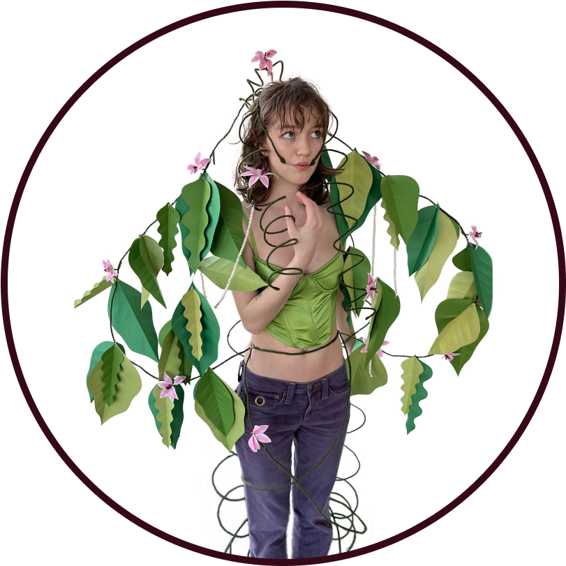 Plant person covered in leaves and flowers